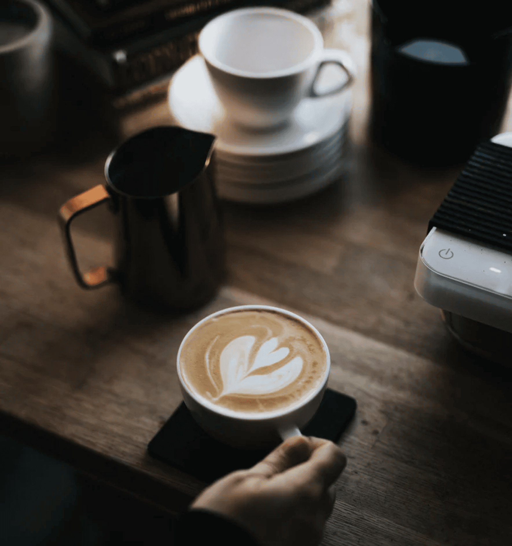 Cup of cappuchino on table